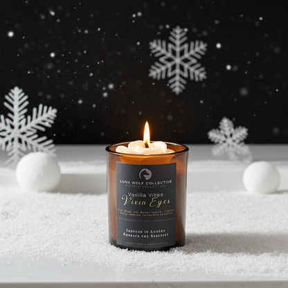 Candle in an amber jar with a label, surrounded by snowflakes and white balls on a dark background